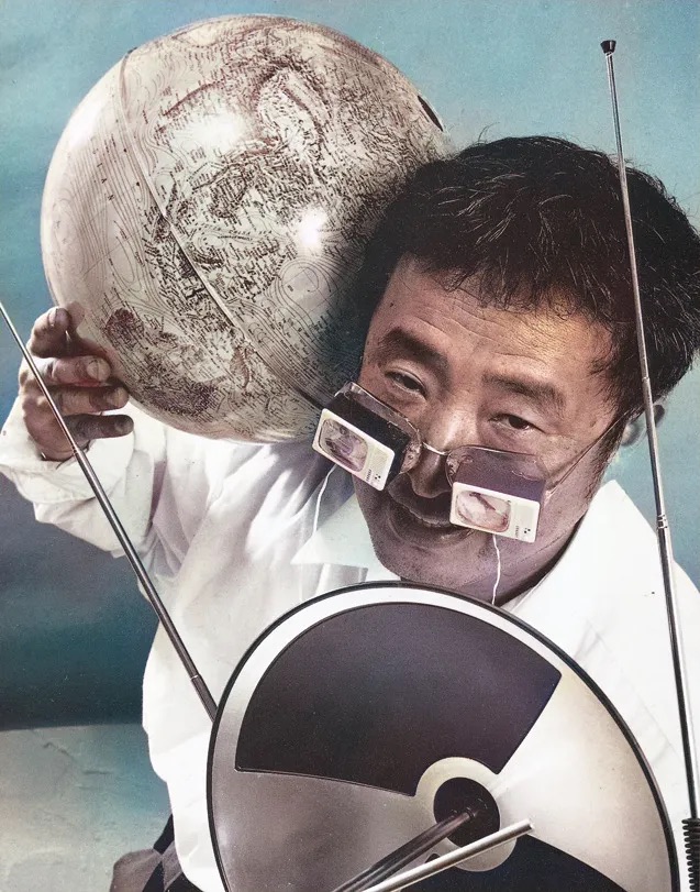 Nam June Paik with globe and antenna